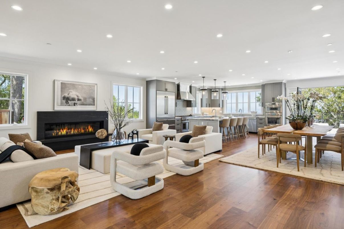 Dining room, Fireplace, Interior, Kitchen, Living room, Pendant Lights, Recessed Lighting, Stainless Steel Appliances, Wood Texture Flooring