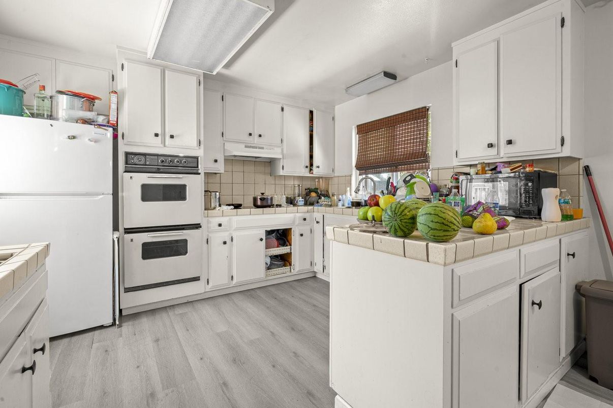 Interior, Kitchen, Tile Countertops, Wood Texture Flooring