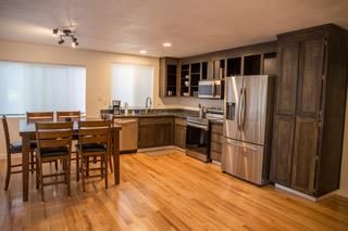 Dining room, Interior, Kitchen, Recessed Lighting, Stainless Steel Appliances, Wood Texture Flooring