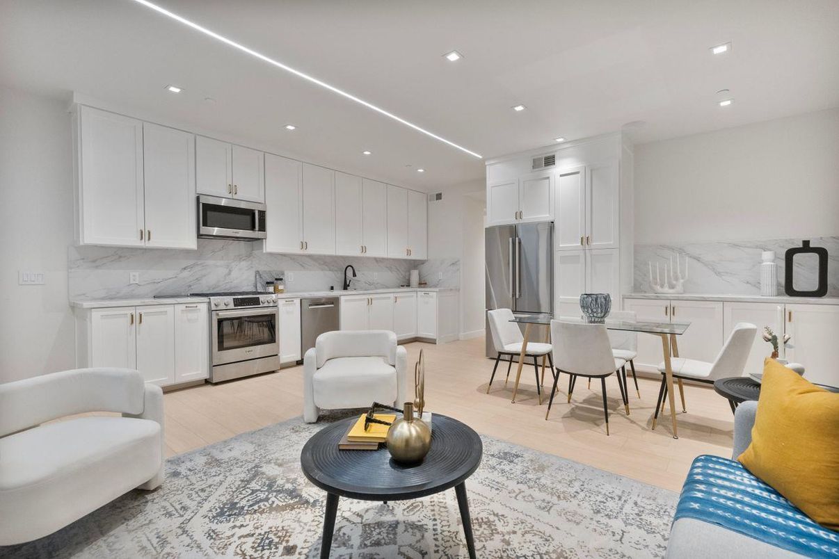 Dining room, Interior, Kitchen, Living room, Marble Walls, Recessed Lighting, Stainless Steel Appliances, Wood Texture Flooring