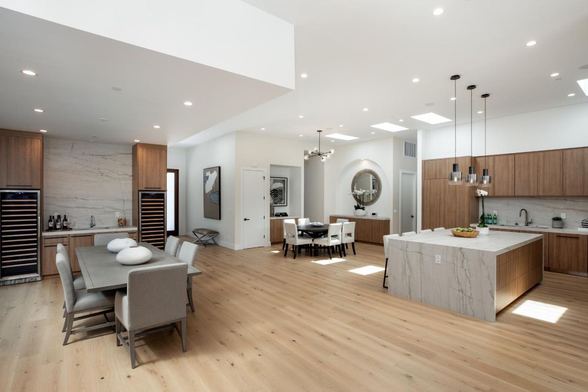 Dining room, Interior, Kitchen, Marble Walls, Pendant Lights, Recessed Lighting, Stainless Steel Appliances, Wood Texture Flooring