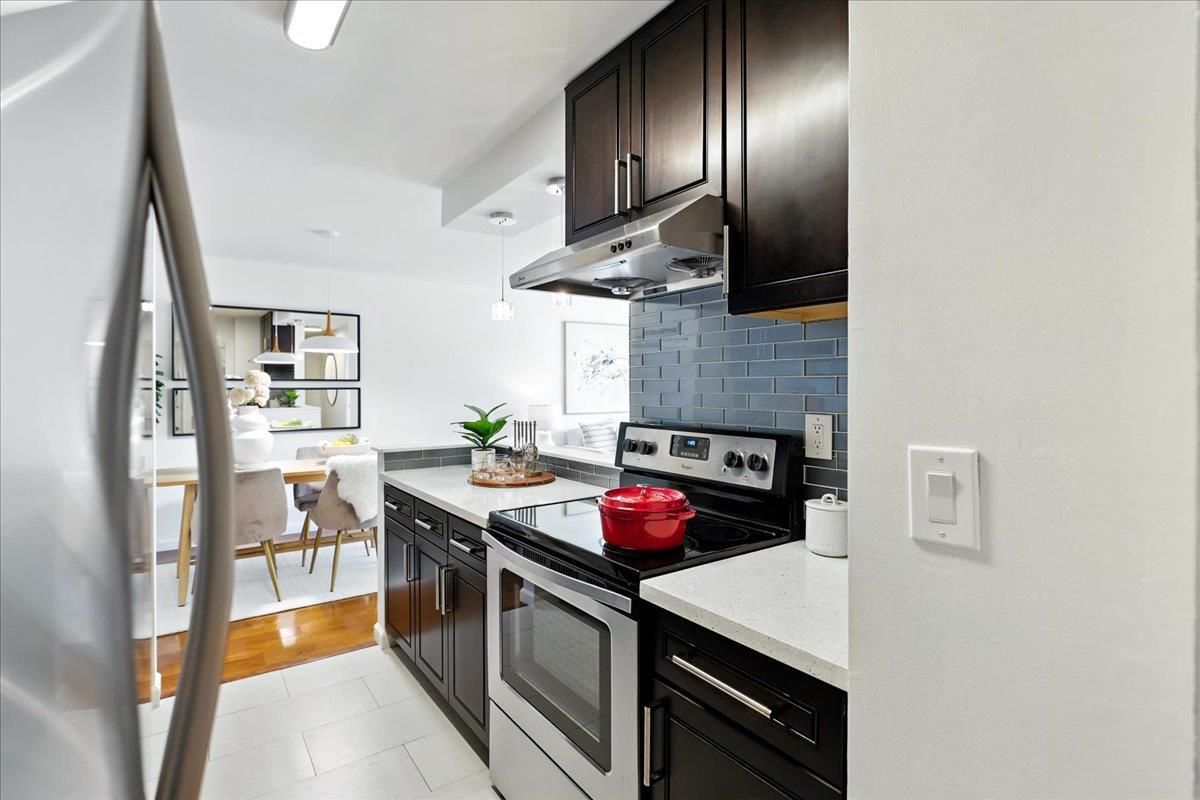 Dining room, Interior, Kitchen, Pendant Lights, Stainless Steel Appliances, Wood Texture Flooring
