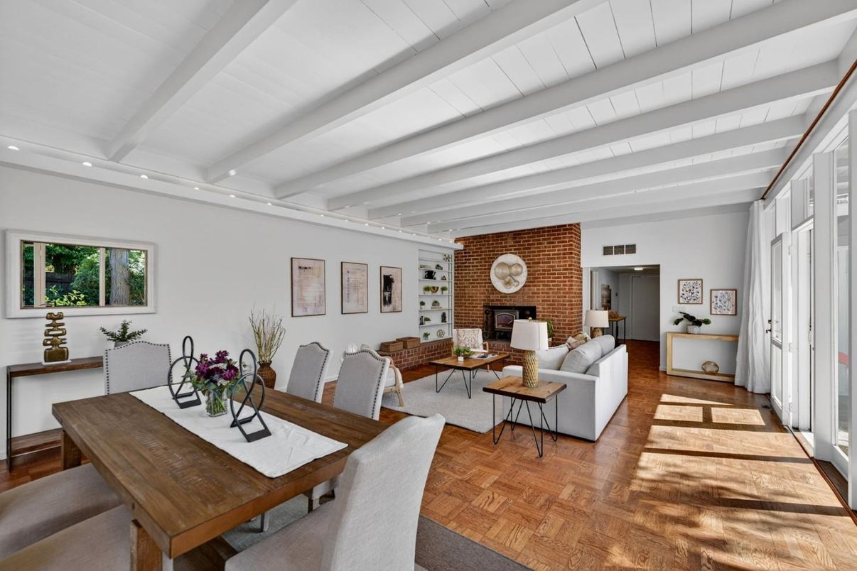 Dining room, Fireplace, Interior, Living room, Recessed Lighting, Stone Walls, Wood Texture Flooring