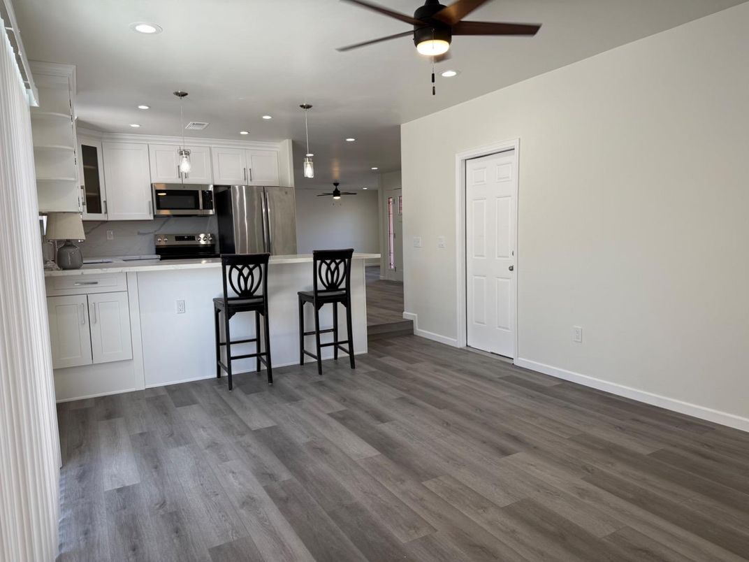 Interior, Kitchen, Pendant Lights, Recessed Lighting, Stainless Steel Appliances, Wood Texture Flooring
