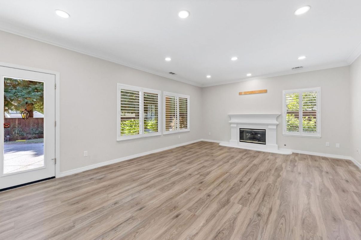 Empty room, Fireplace, Interior, Recessed Lighting, Wood Texture Flooring
