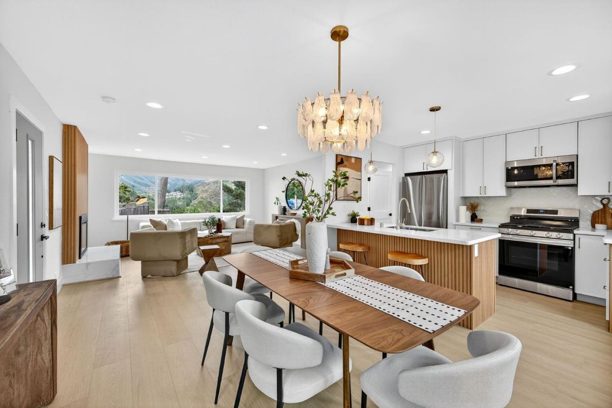 Chandelier, Dining room, Interior, Kitchen, Living room, Pendant Lights, Recessed Lighting, Stainless Steel Appliances, Wood Texture Flooring