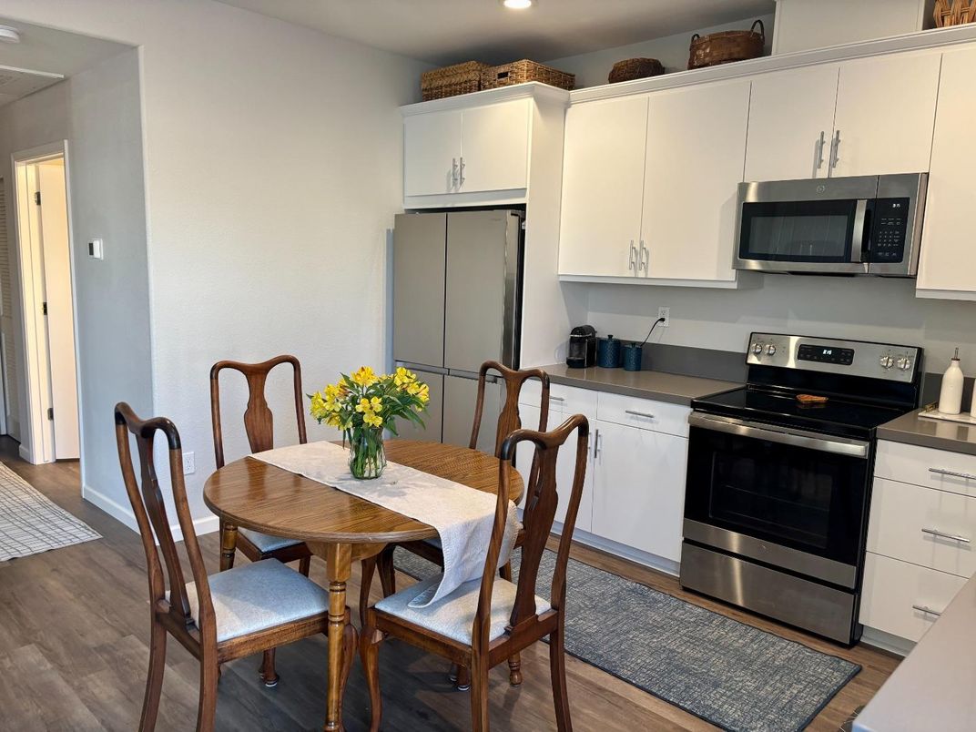 Dining room, Interior, Kitchen, Recessed Lighting, Stainless Steel Appliances, Wood Texture Flooring