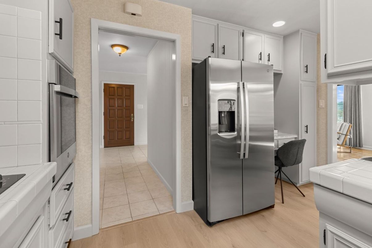 Interior, Kitchen, Recessed Lighting, Stainless Steel Appliances, Tile Countertops, Wood Texture Flooring
