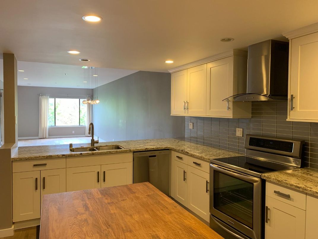 Interior, Kitchen, Pendant Lights, Recessed Lighting, Stainless Steel Appliances, Wood Texture Flooring