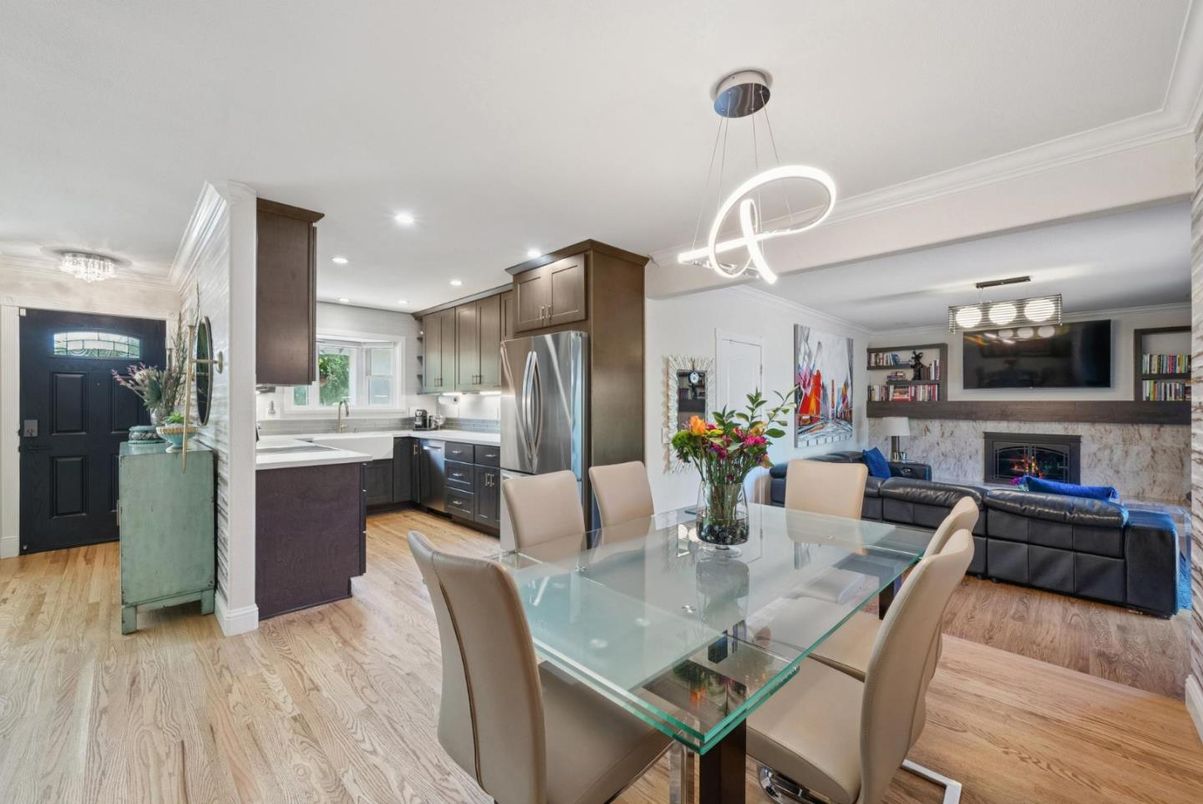 Dining room, Fireplace, Interior, Kitchen, Living room, Pendant Lights, Recessed Lighting, Stainless Steel Appliances, Wood Texture Flooring