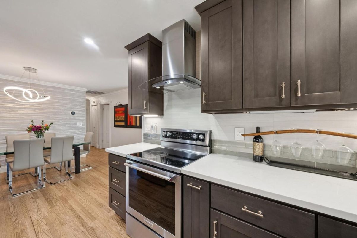 Dining room, Interior, Kitchen, Pendant Lights, Recessed Lighting, Stainless Steel Appliances, Wood Texture Flooring