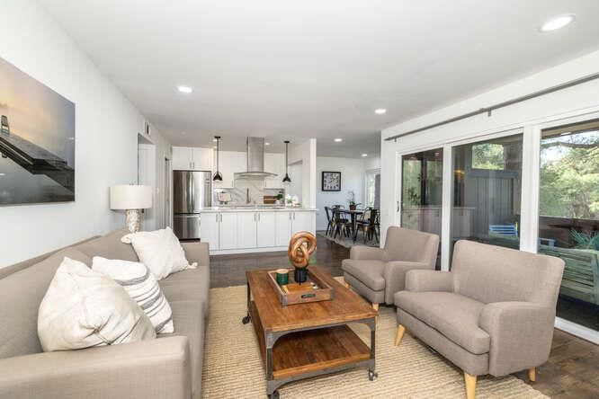 Dining room, Interior, Kitchen, Living room, Recessed Lighting, Stainless Steel Appliances, Wood Texture Flooring