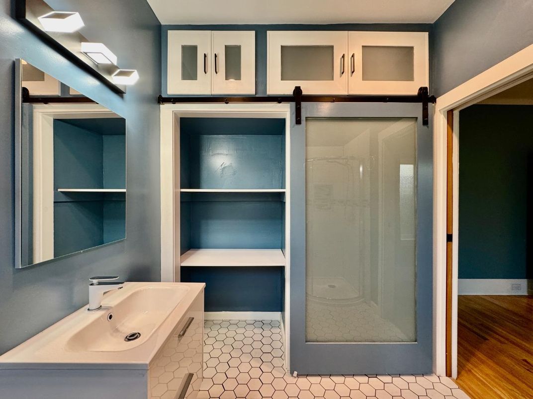Bathroom, Dual Sink Vanities, Glass Shower, Interior, Wood Texture Flooring