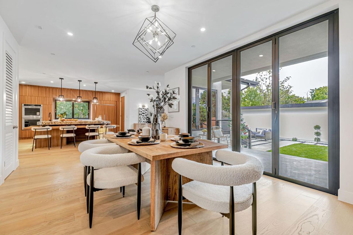 Dining room, Interior, Kitchen, Pendant Lights, Recessed Lighting, Stainless Steel Appliances, Wood Texture Flooring