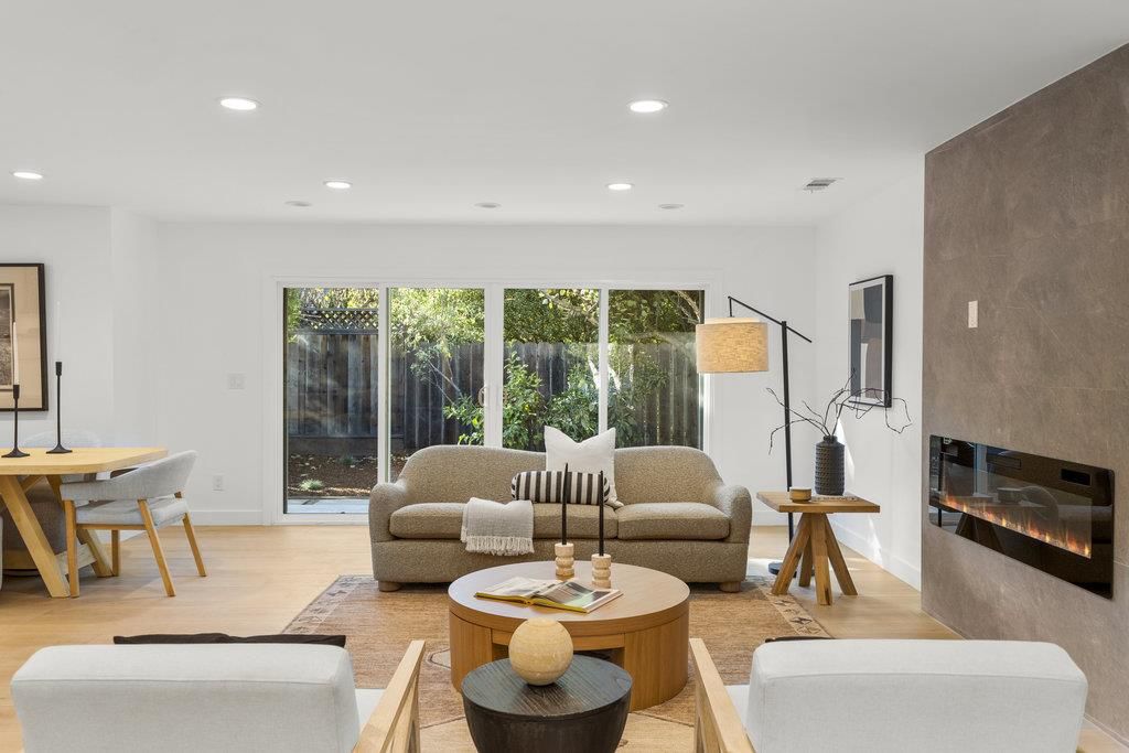 Dining room, Fireplace, Interior, Living room, Recessed Lighting, Wood Texture Flooring