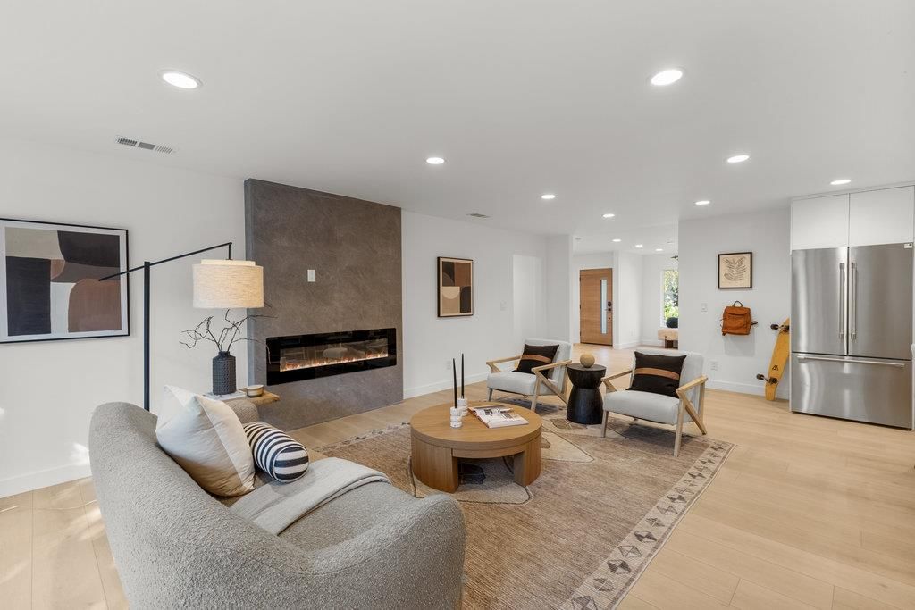 Fireplace, Interior, Kitchen, Living room, Recessed Lighting, Stainless Steel Appliances, Wood Texture Flooring