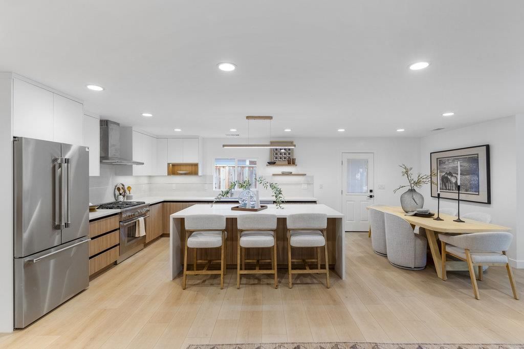 Dining room, Interior, Kitchen, Pendant Lights, Recessed Lighting, Stainless Steel Appliances, Wood Texture Flooring