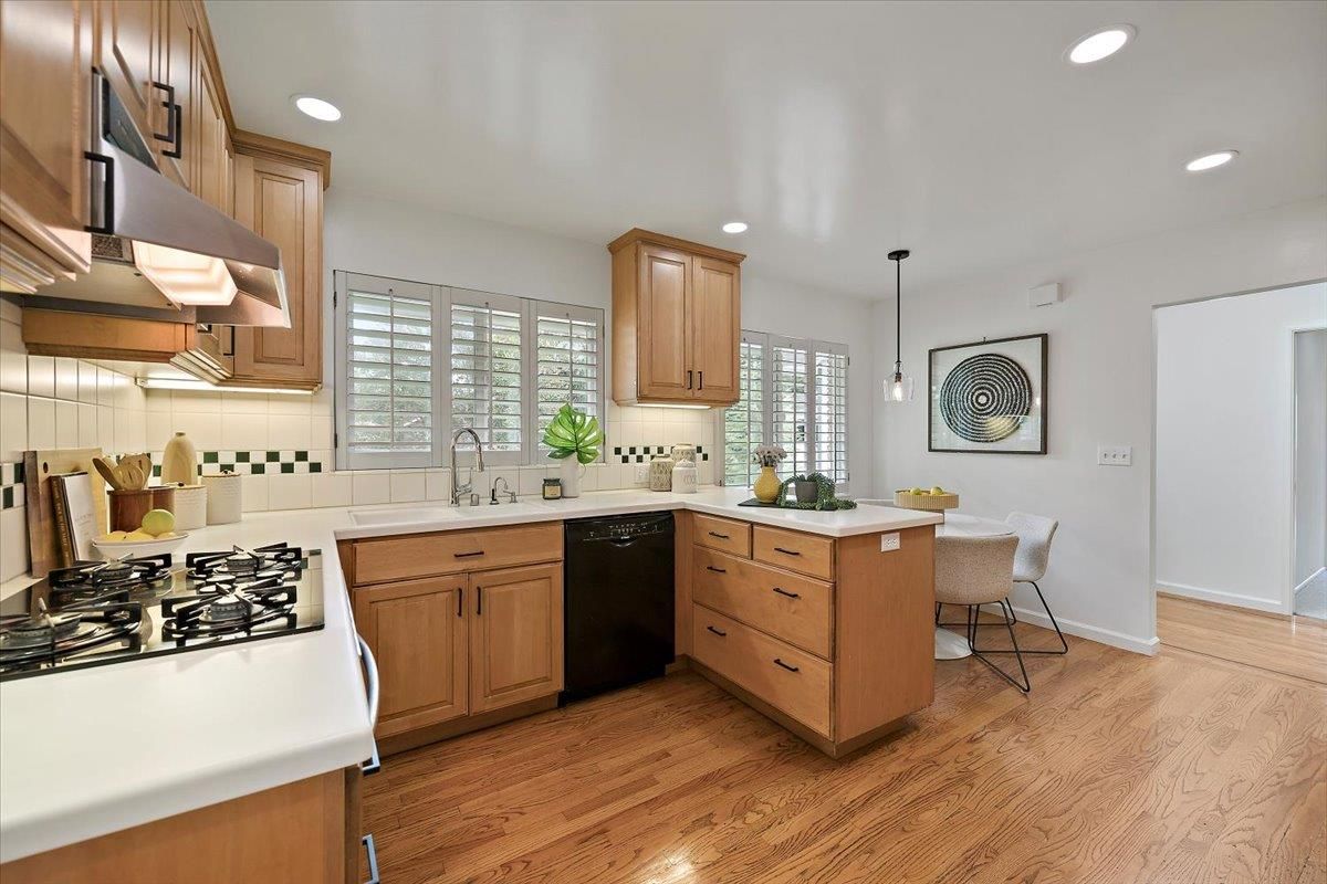 Dining room, Interior, Kitchen, Pendant Lights, Recessed Lighting, Stainless Steel Appliances, Wood Texture Flooring