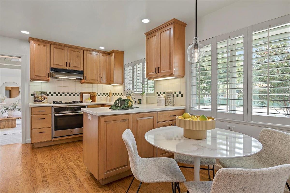 Dining room, Interior, Kitchen, Pendant Lights, Recessed Lighting, Stainless Steel Appliances, Wood Texture Flooring