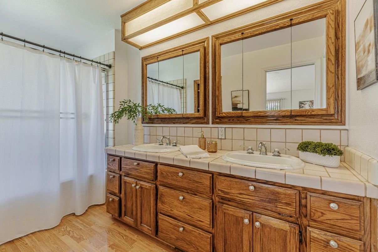 Bathroom, Dual Sink Vanities, Interior, Tile Countertops, Wood Texture Flooring