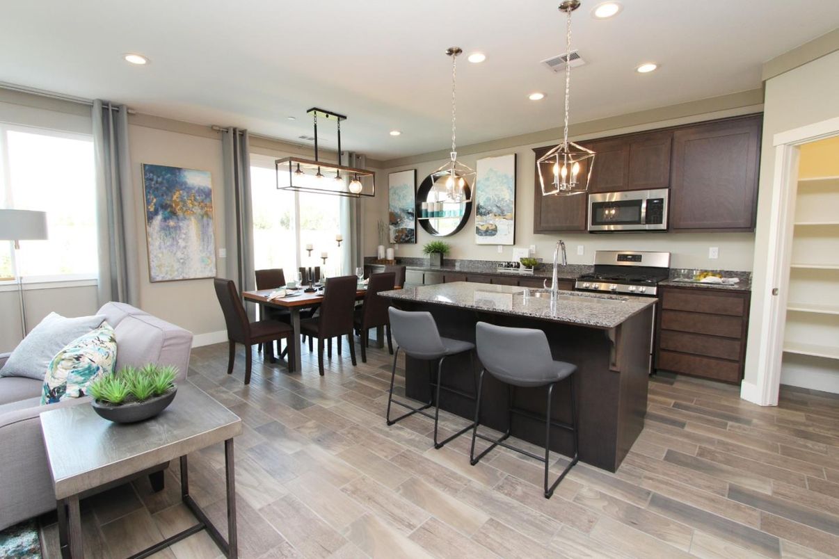 Dining room, Interior, Kitchen, Pendant Lights, Recessed Lighting, Stainless Steel Appliances, Wood Texture Flooring
