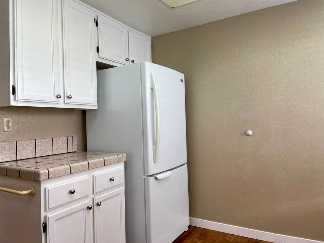 Interior, Kitchen, Tile Countertops, Wood Texture Flooring