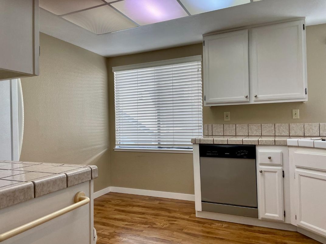 Interior, Kitchen, Tile Countertops, Wood Texture Flooring