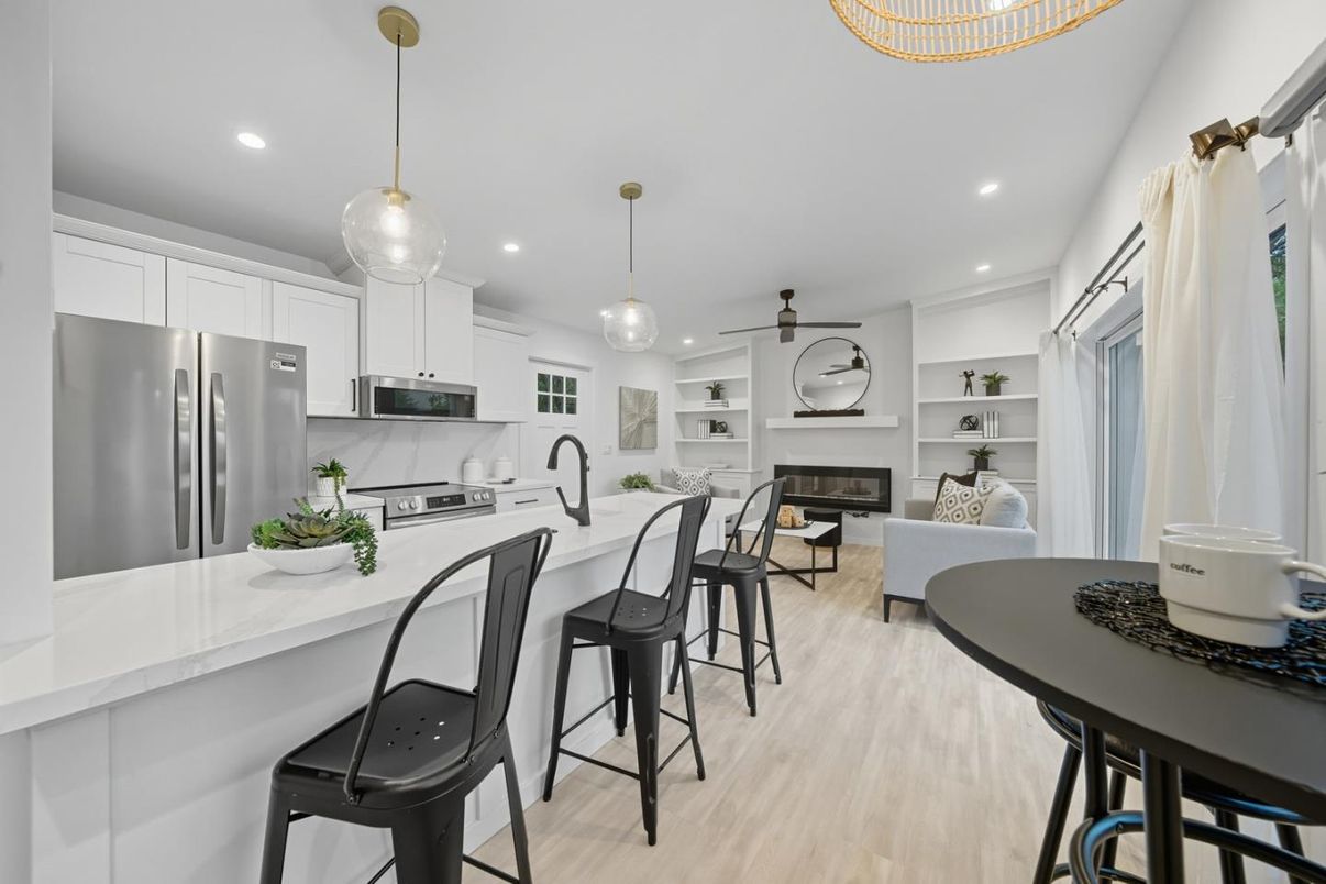 Fireplace, Interior, Kitchen, Pendant Lights, Recessed Lighting, Stainless Steel Appliances, Wood Texture Flooring