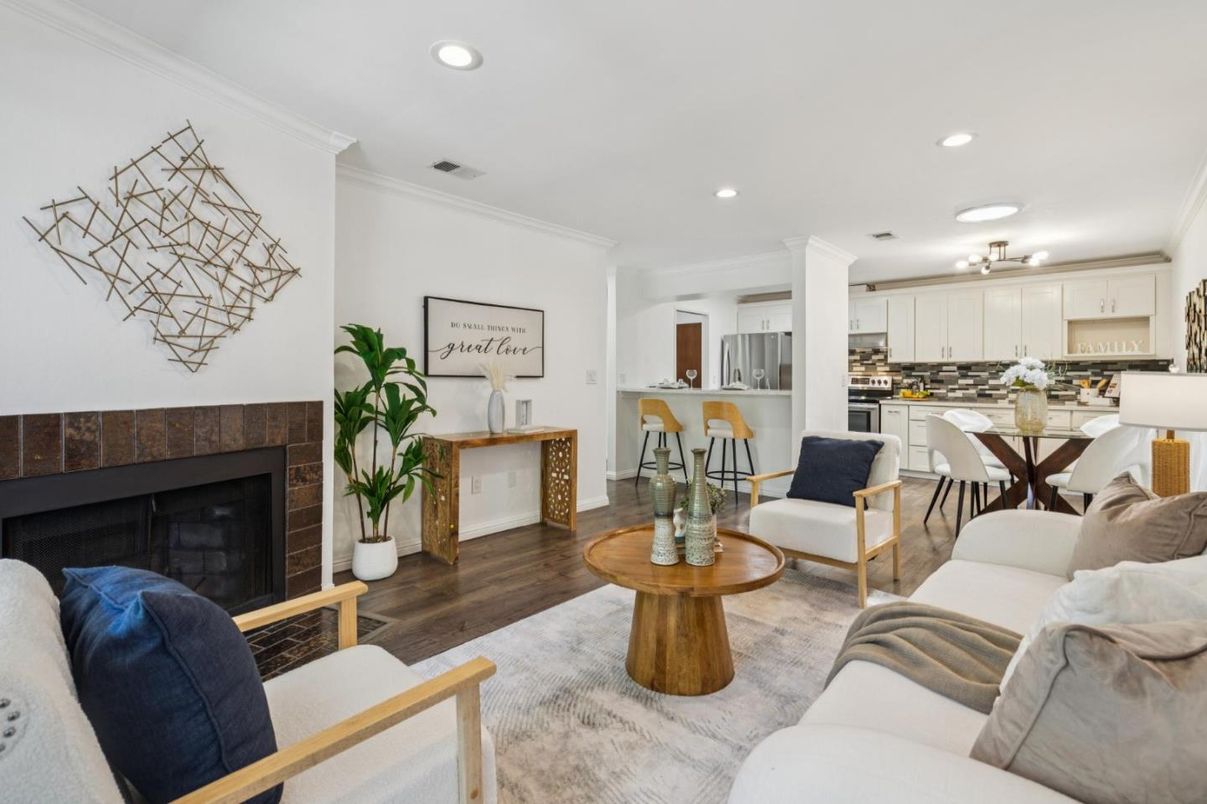 Dining room, Fireplace, Interior, Kitchen, Living room, Recessed Lighting, Stainless Steel Appliances, Wood Texture Flooring