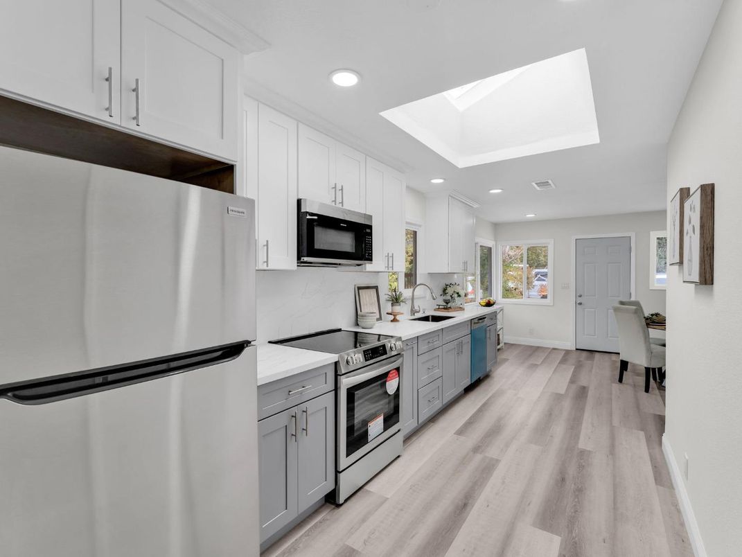 Interior, Kitchen, Recessed Lighting, Stainless Steel Appliances, Wood Texture Flooring