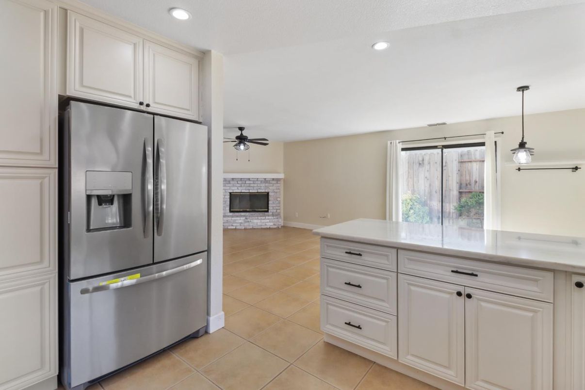 Fireplace, Interior, Kitchen, Pendant Lights, Recessed Lighting, Stainless Steel Appliances