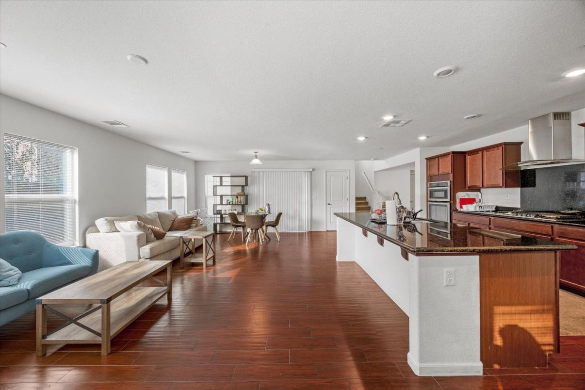 Dining room, Interior, Kitchen, Living room, Recessed Lighting, Stainless Steel Appliances, Wood Texture Flooring