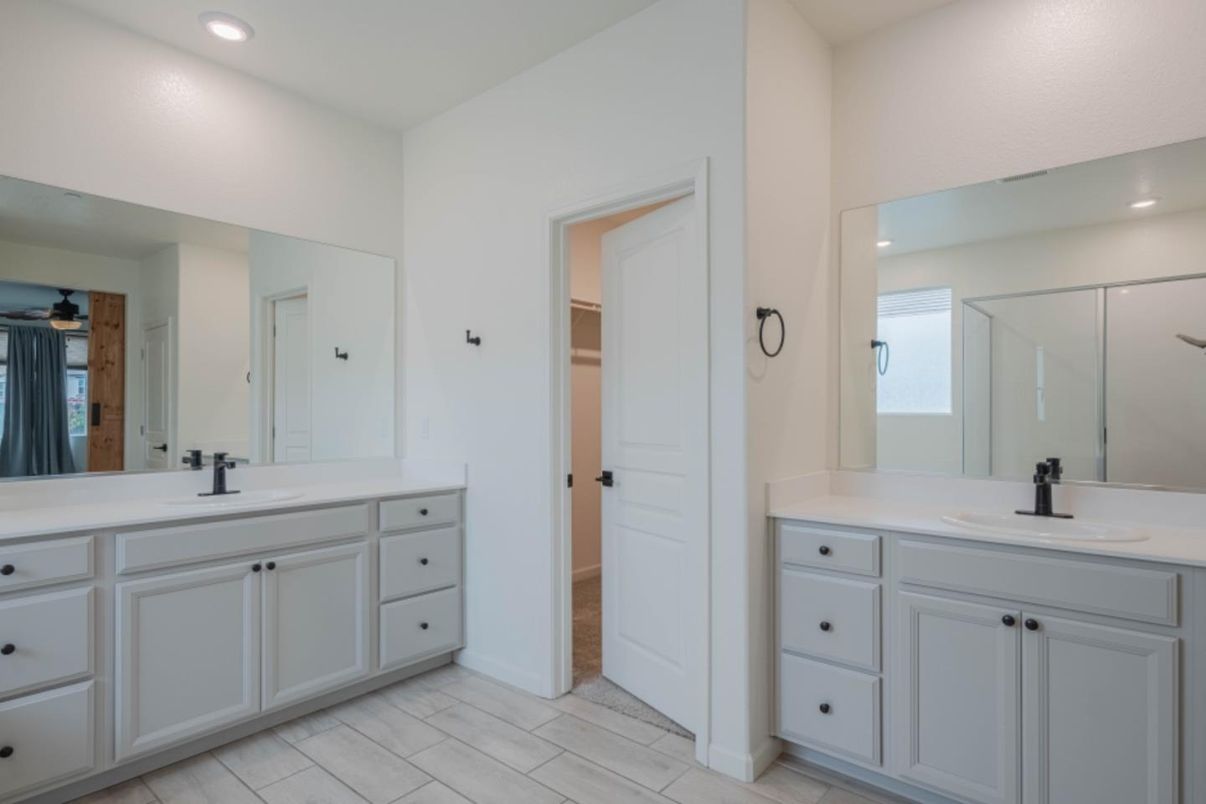 Bathroom, Dual Sink Vanities, Glass Shower, Interior, Recessed Lighting, Wood Texture Flooring
