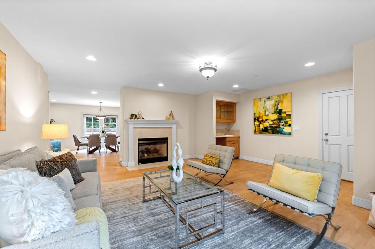 Dining room, Fireplace, Interior, Living room, Pendant Lights, Recessed Lighting, Wood Texture Flooring