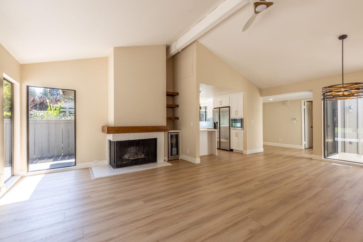 Empty room, Fireplace, Interior, Kitchen, Pendant Lights, Wood Texture Flooring