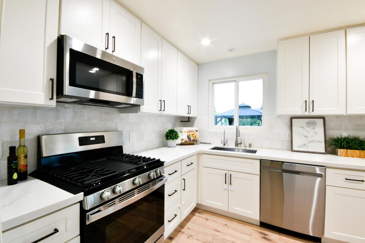 Interior, Kitchen, Recessed Lighting, Stainless Steel Appliances, Wood Texture Flooring