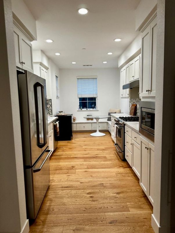 Interior, Kitchen, Recessed Lighting, Stainless Steel Appliances, Wood Texture Flooring