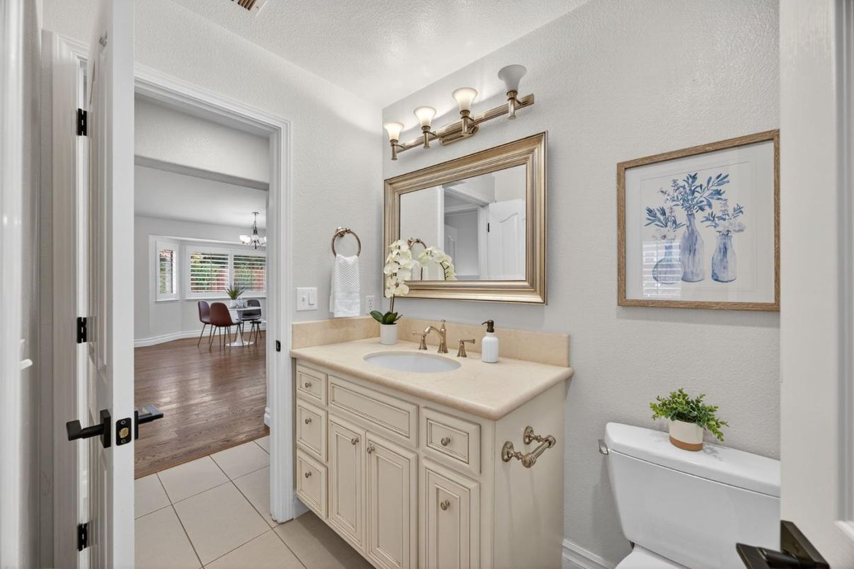 Bathroom, Chandelier, Dining room, Dual Sink Vanities, Interior, Wood Texture Flooring