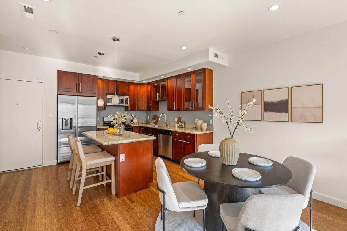 Dining room, Interior, Kitchen, Pendant Lights, Recessed Lighting, Stainless Steel Appliances, Wood Texture Flooring