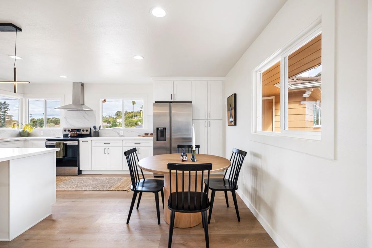 Dining room, Interior, Kitchen, Pendant Lights, Recessed Lighting, Stainless Steel Appliances, Wood Texture Flooring