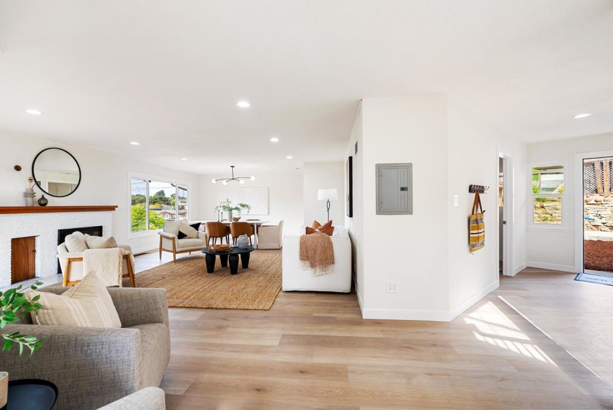 Dining room, Fireplace, Interior, Living room, Pendant Lights, Recessed Lighting, Wood Texture Flooring