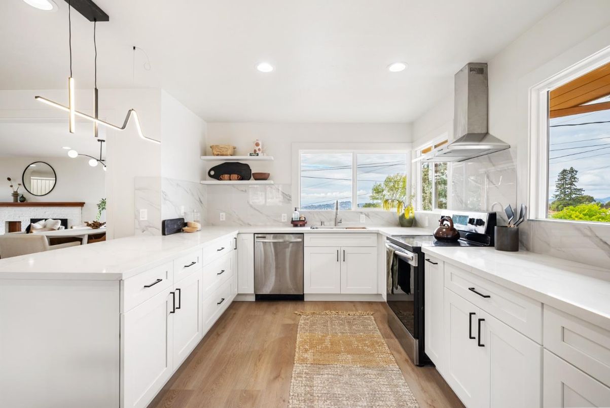 Interior, Kitchen, Marble Walls, Pendant Lights, Recessed Lighting, Stainless Steel Appliances, Wood Texture Flooring