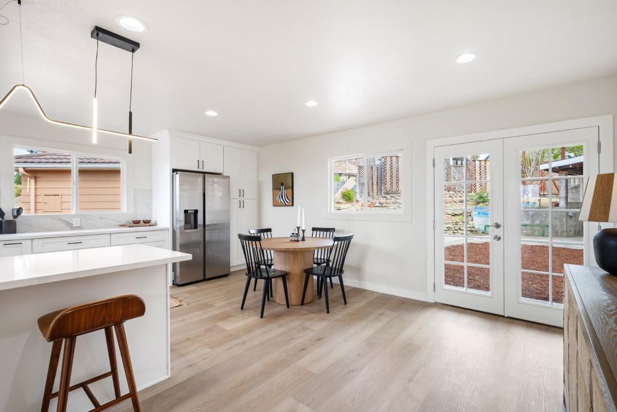 Dining room, Interior, Kitchen, Pendant Lights, Recessed Lighting, Stainless Steel Appliances, Wood Texture Flooring