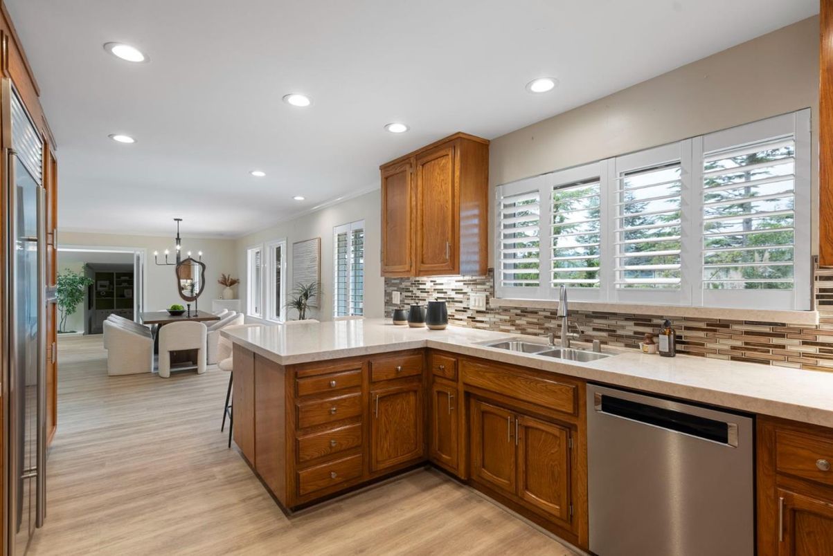 Chandelier, Dining room, Interior, Kitchen, Recessed Lighting, Stainless Steel Appliances, Wood Texture Flooring