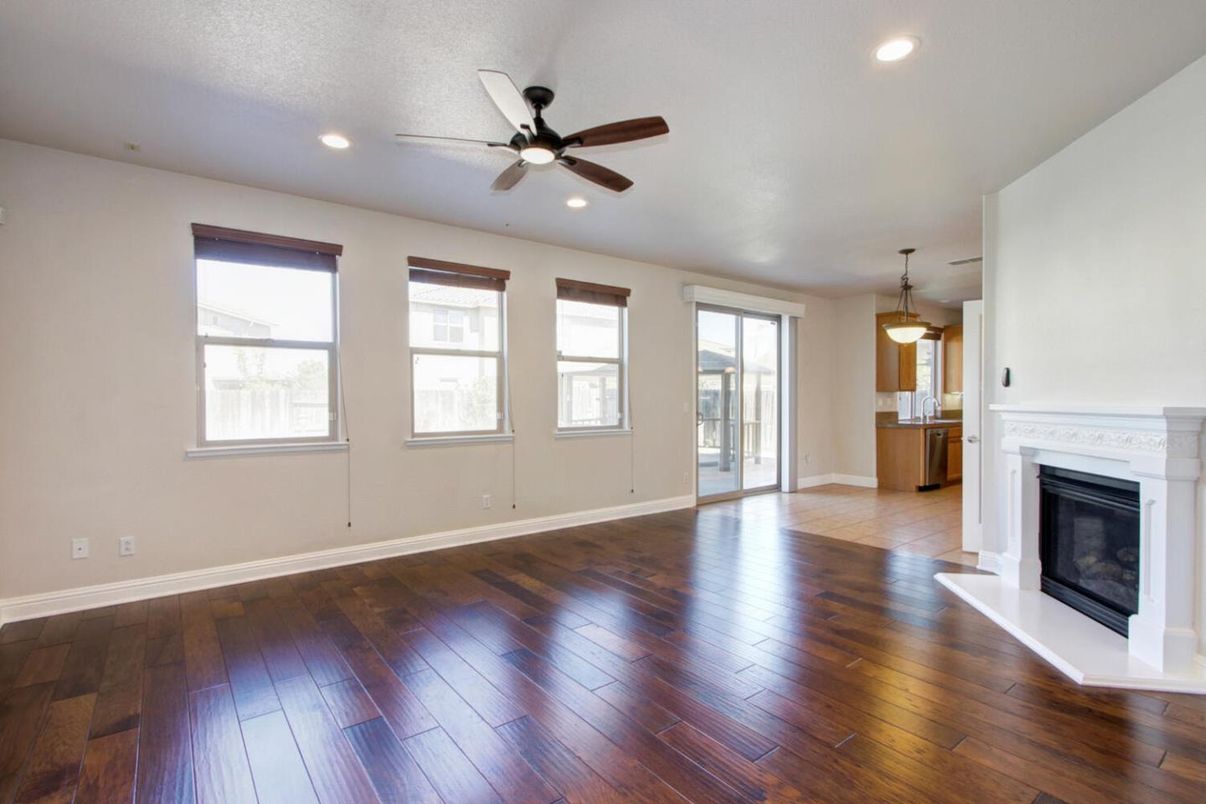 Empty room, Fireplace, Interior, Pendant Lights, Recessed Lighting, Wood Texture Flooring