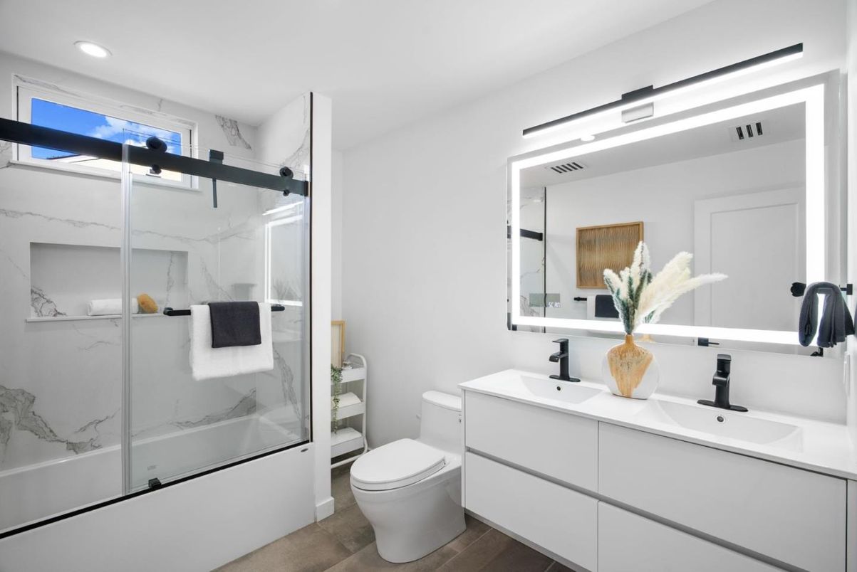 Bathroom, Dual Sink Vanities, Glass Shower, Interior, Marble Walls, Recessed Lighting