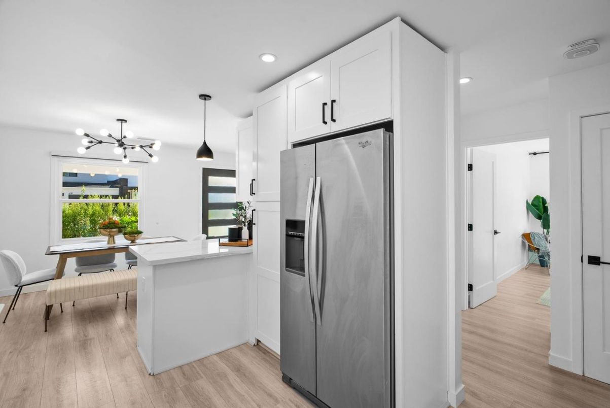 Dining room, Interior, Kitchen, Pendant Lights, Recessed Lighting, Stainless Steel Appliances, Wood Texture Flooring