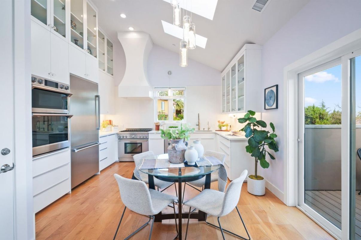 Dining room, Interior, Kitchen, Pendant Lights, Recessed Lighting, Stainless Steel Appliances, Wood Texture Flooring