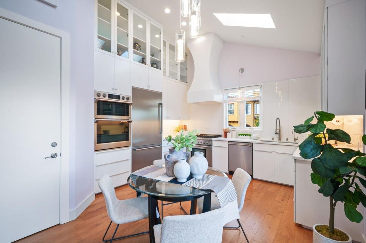 Dining room, Interior, Kitchen, Pendant Lights, Recessed Lighting, Stainless Steel Appliances, Wood Texture Flooring