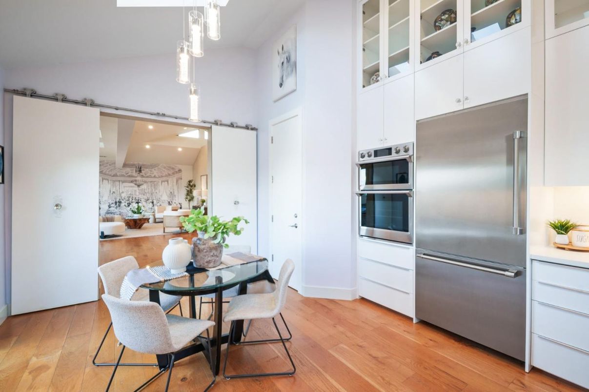 Dining room, Interior, Kitchen, Pendant Lights, Recessed Lighting, Stainless Steel Appliances, Wood Texture Flooring